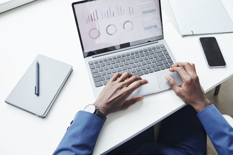 Man working with graphs online